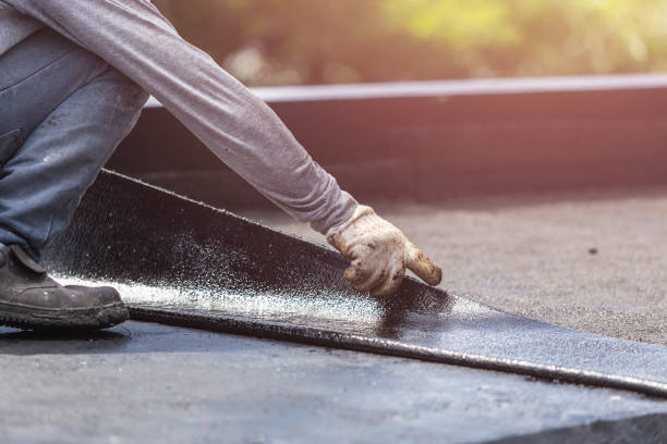 Professional Basement Waterproofing technician working in Hughesville, PA
